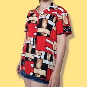 Funky size M Notations Blouse with red, black, white, and gold geometric pattern